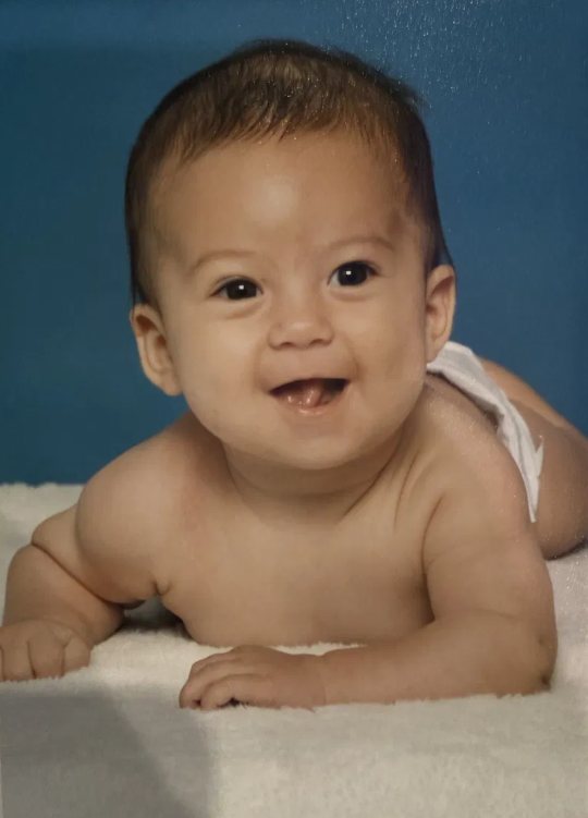 Cortland as a smiling baby