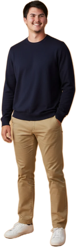 Cortland Clarke in a navy sweater and khakis